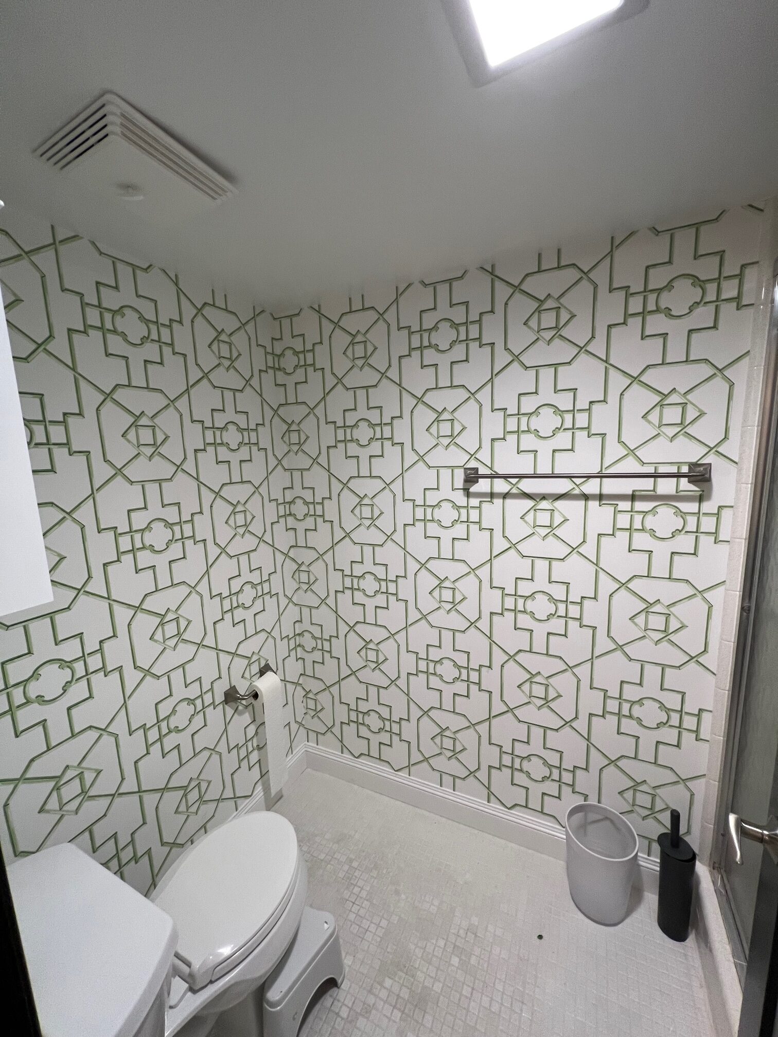 After: Luxury powder room with designer wallpaper